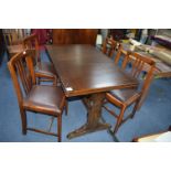1950's Dark Oak Drawer Leaf Dining Table with Four Upholstered Chairs