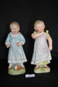 Pair of Victorian Bisque Figures of Toddlers