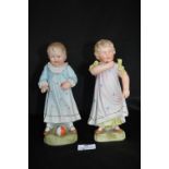 Pair of Victorian Bisque Figures of Toddlers