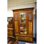 Edwardian Mahogany Wardrobe with Carved Panels, Walnut Panels and Beveled Edge Mirror