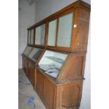 Oak Display Cabinet with Graduated Glass Front Enclosed by Double Doors over Solid Paneled Cupboards