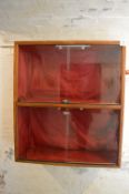 Glazed Display Cabinet Enclosed by Sliding Glass Doors