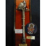 Johnstone Collection: Miniature Ornamental Basket Sword and Johnstone Clan Crest