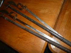 Two Reproduction Halberds and Two Swords
