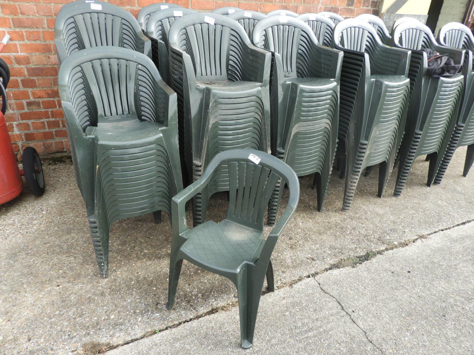 Twenty Green Plastic Stackable Chairs