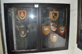 Wall Mounted Display Cabinet Containing Seven Regimental Shields