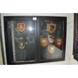 Wall Mounted Display Cabinet Containing Seven Regimental Shields