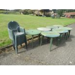 Nine Green Plastic Stackable Chairs and Seven Circular Tables