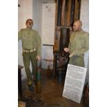 Two Waxwork Models Depicting WWII Soldiers Working the Shell Hoist