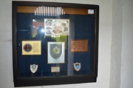 Wall Mounted Display Cabinet Containing Presentation Plaques