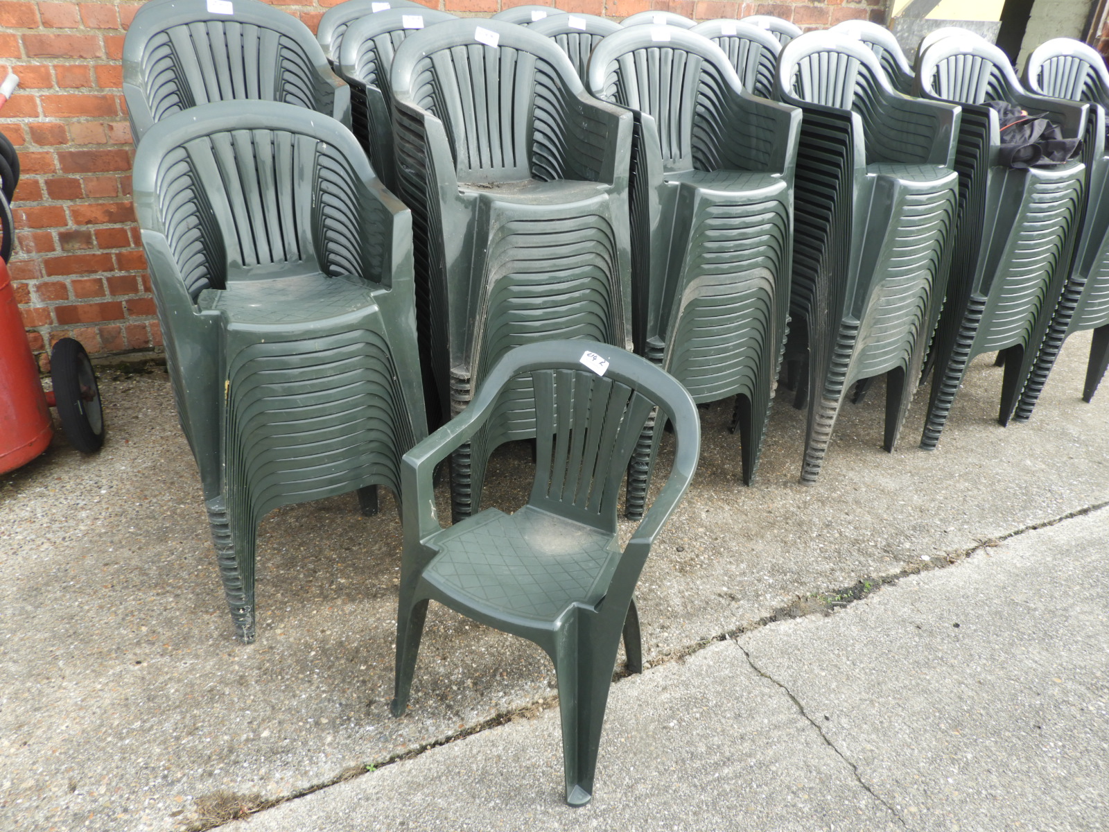 Twenty Green Plastic Stackable Chairs