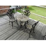 Cast Iron Table with Three Chairs