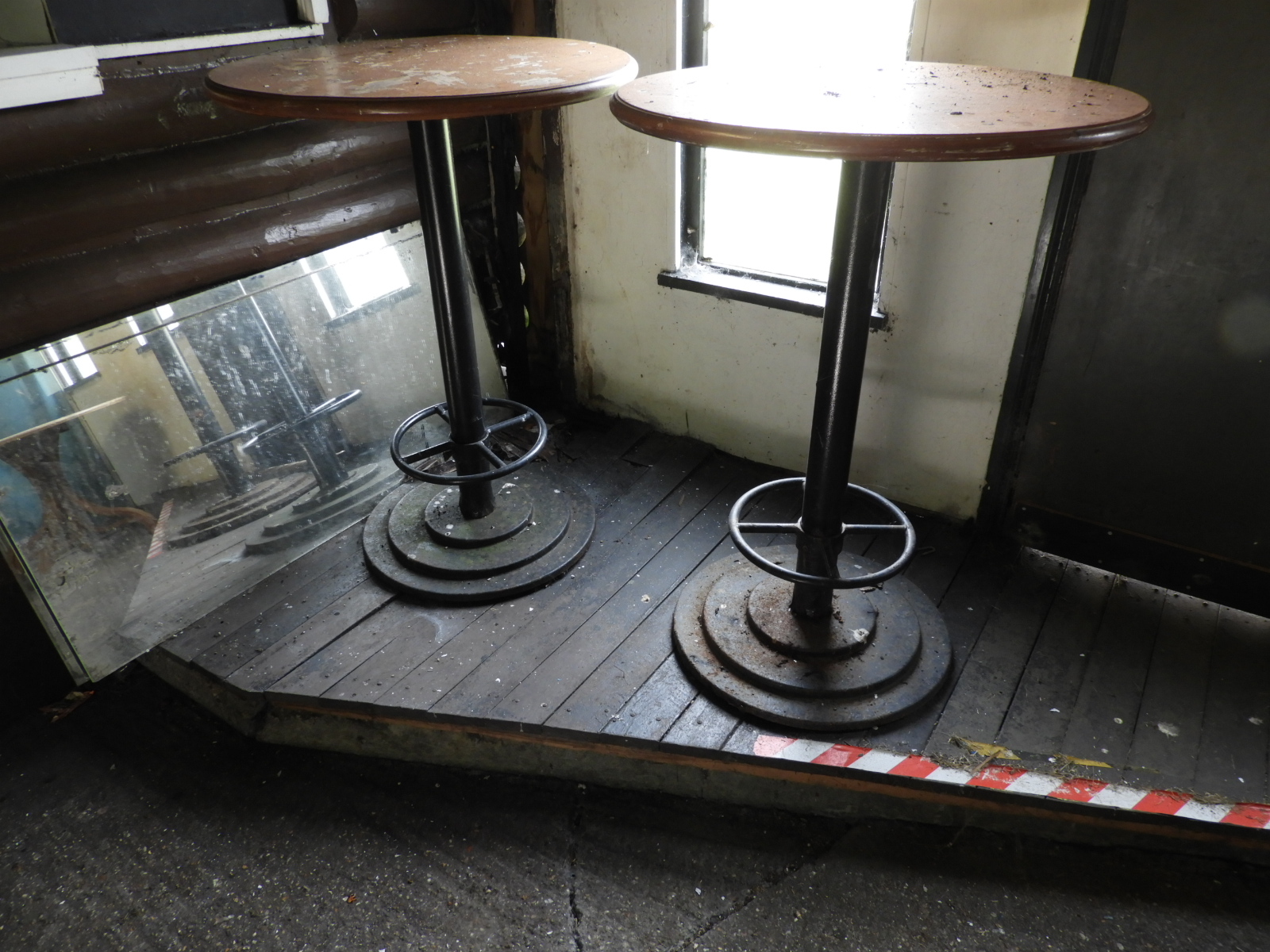 Two Poser Tables on Cast Iron Pedestals