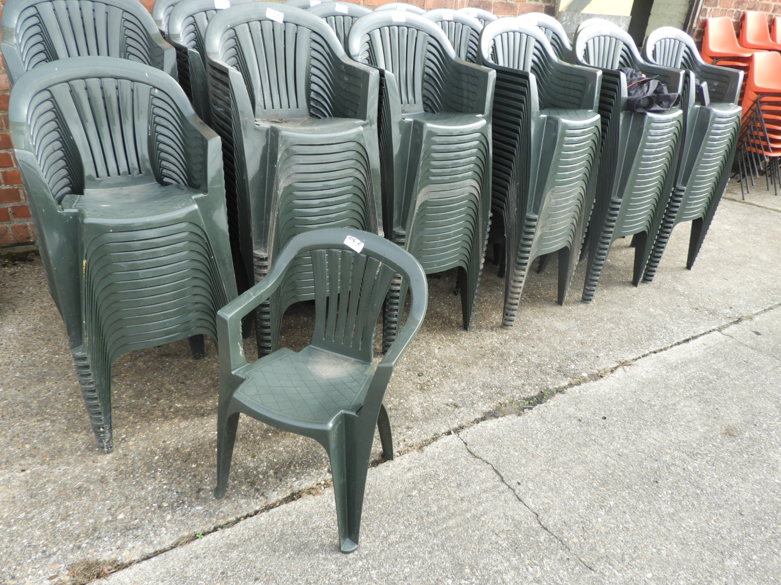 Twenty Green Plastic Stackable Chairs