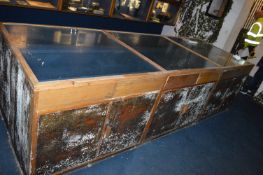 Central Display Cabinet with Glass Top over Cupboards