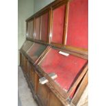 Oak Display Cabinet with Graduated Glass Front Enclosed by Double Doors over Solid Paneled Cupboards