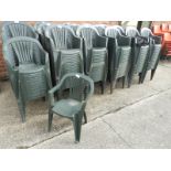 Nineteen Green Plastic Stackable Chairs