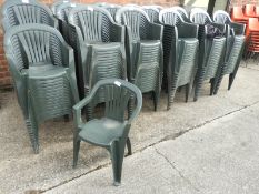 Nineteen Green Plastic Stackable Chairs