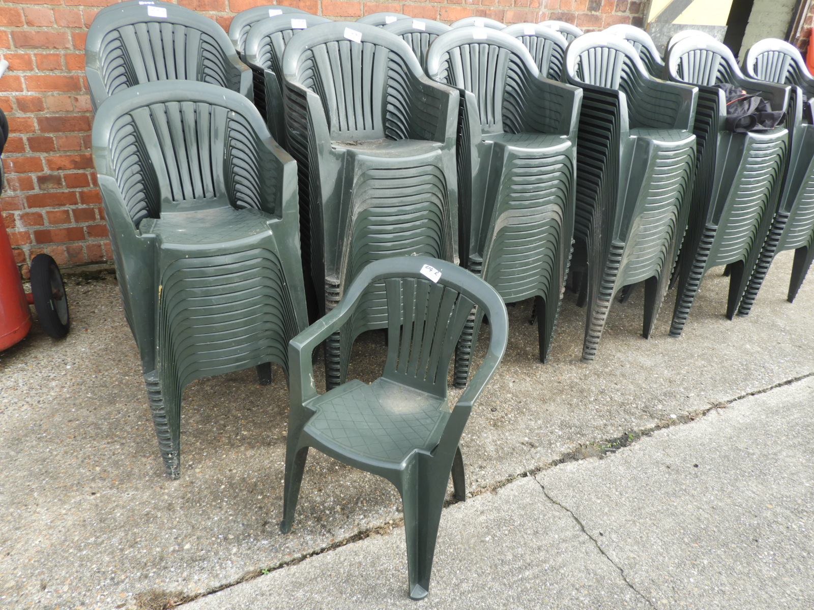 Twenty Green Plastic Stackable Chairs