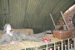 Reclining Female Mannequin Depicting a Land Girl with Wicker Basket