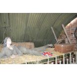 Reclining Female Mannequin Depicting a Land Girl with Wicker Basket