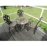 Cast Iron Table with Three Chairs