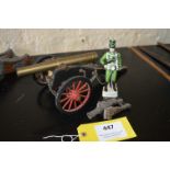 Two Small Model Cannon and a China Figurine of a Rifle Brigade Officer