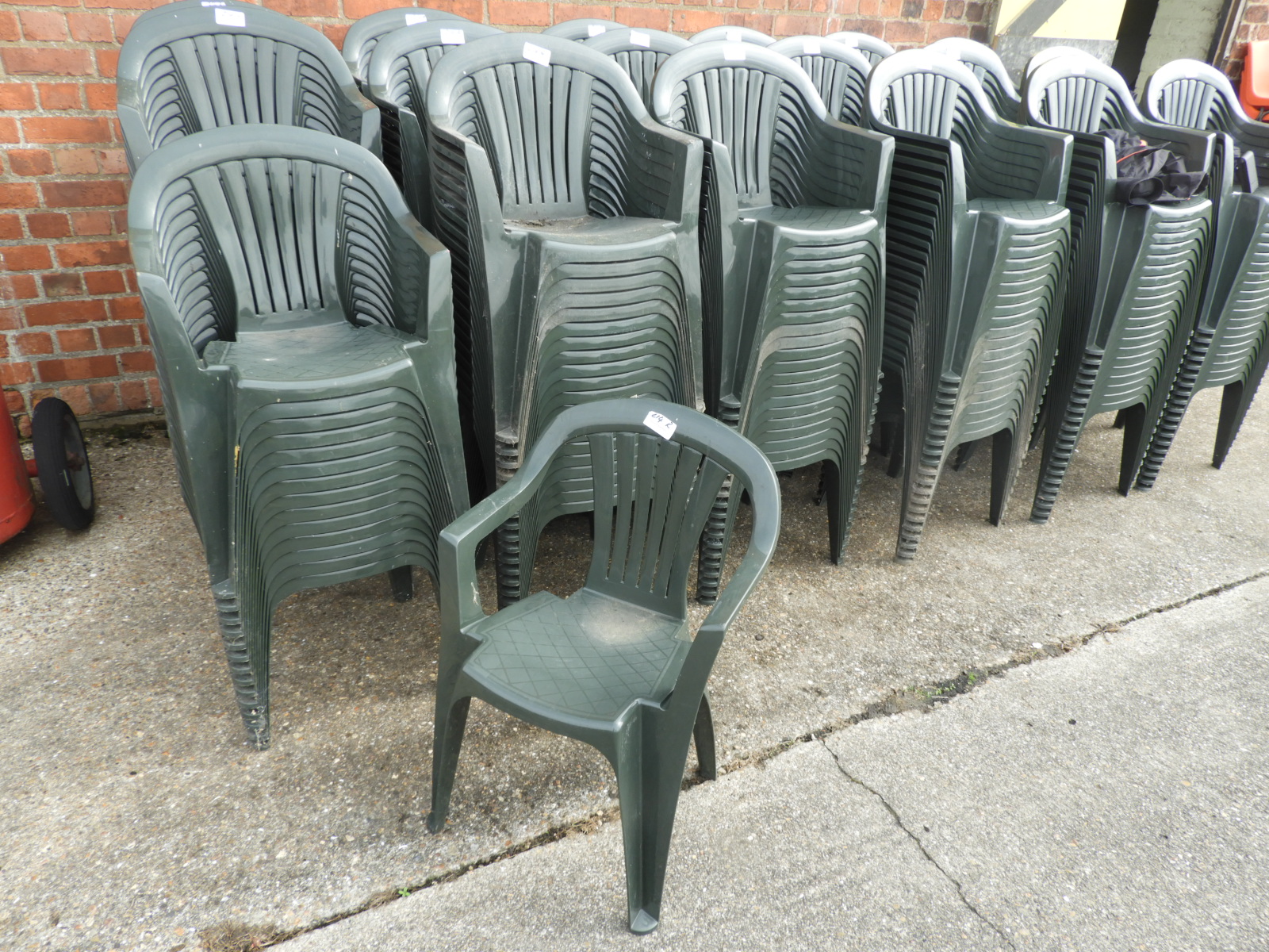 Twenty Green Plastic Stackable Chairs