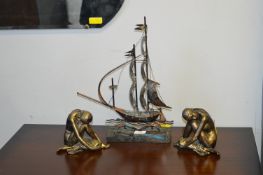 Ornamental Metal Ship and Two Female Figures