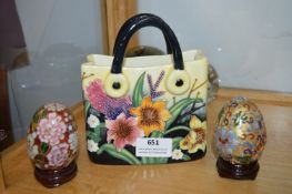 Porcelain Handbag and Two Cloisonne Eggs