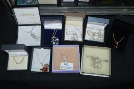 Nine Boxed 925 Sterling Silver Pendants & Chains