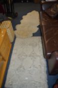 Two Rugs Including one Sheepskin