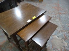 Nest of Three Dark Teak Tables