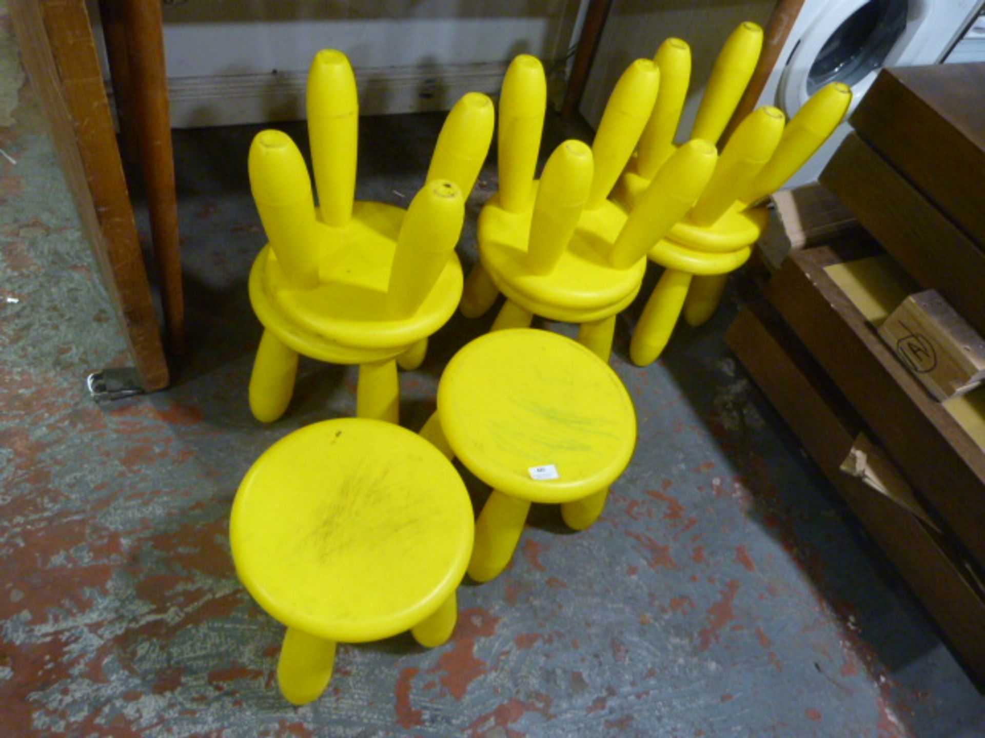 * Eight Yellow Plastic Stools