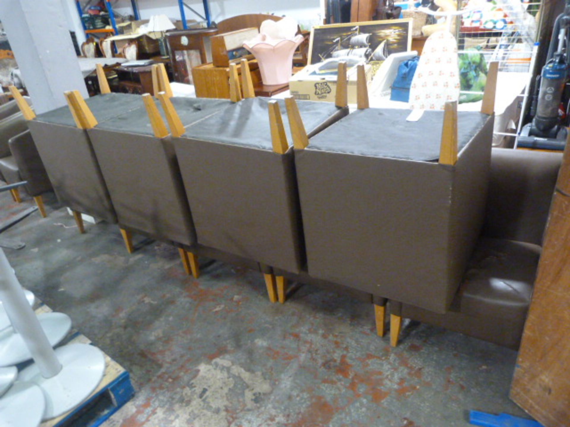 * Eleven Brown Upholstered Tub Chairs