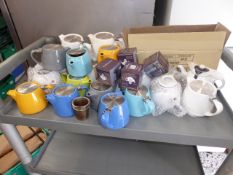 * approx. 24 assorted new and used teapotsand accessories
