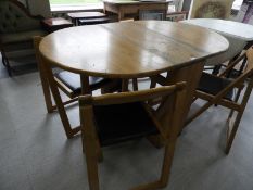 Gate Legged Table with Four Folding Chairs