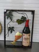 Piece of Metal Wall Art Depicting Wine Bottle and Glass