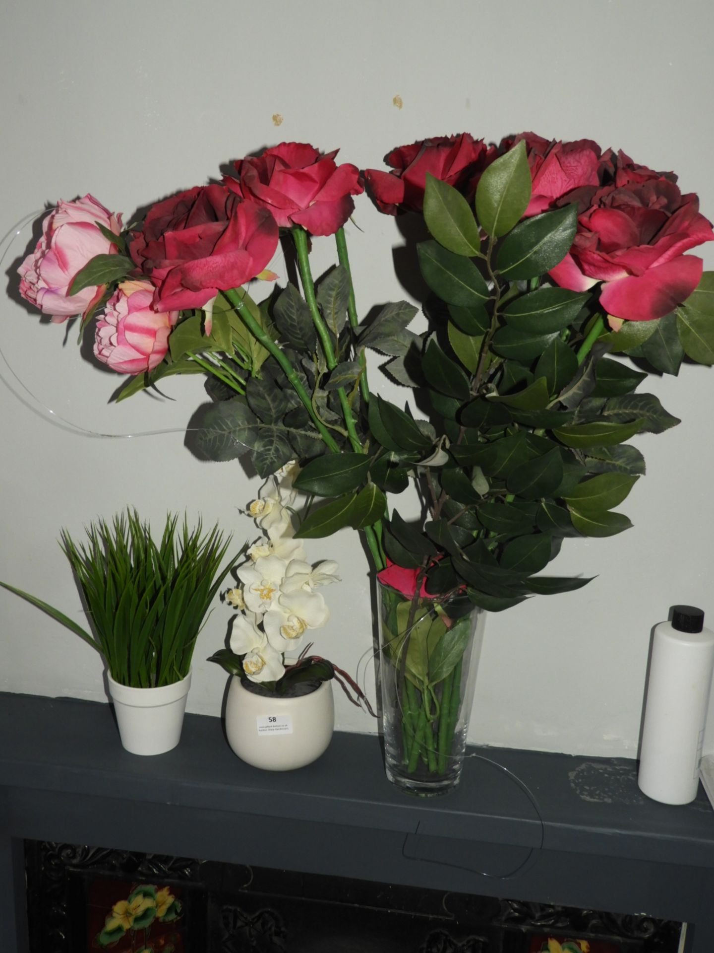 *Three Artificial Flowers