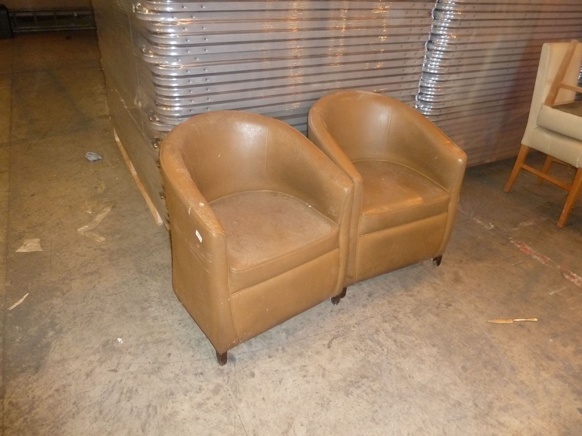 * 2 x brown arm chairs