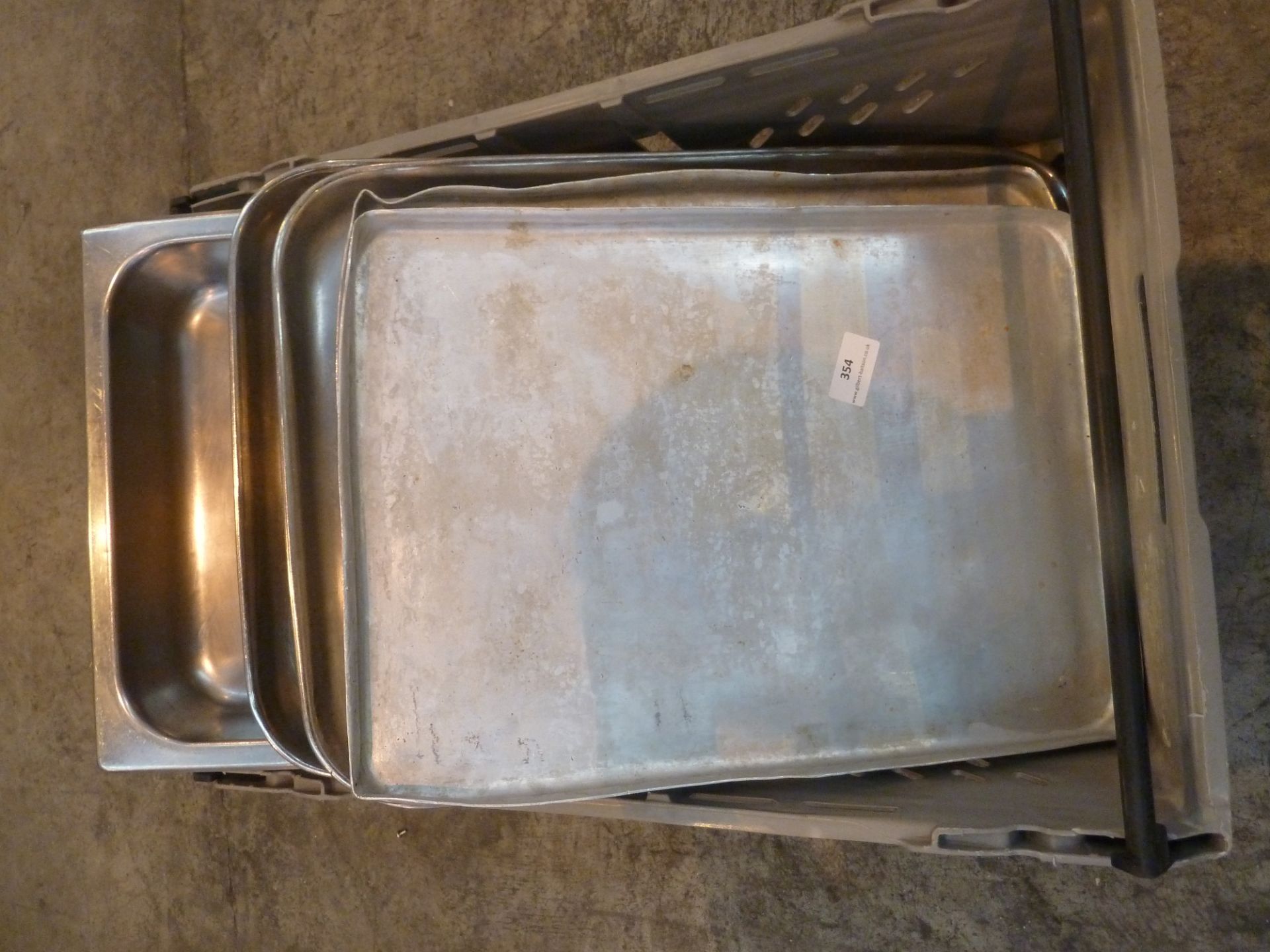 * assortment of metal trays