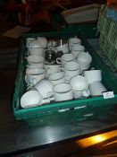 * assortment of white tea cups