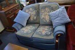Two Seat Sofa with Blue Floral Cushions