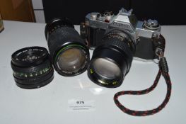 Vintage Binoculars and a Canon AV1 Camera, plus Lenses