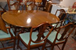 Extending Oval Dining Table with Six Chairs