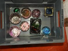 *Nine Glass Paperweights