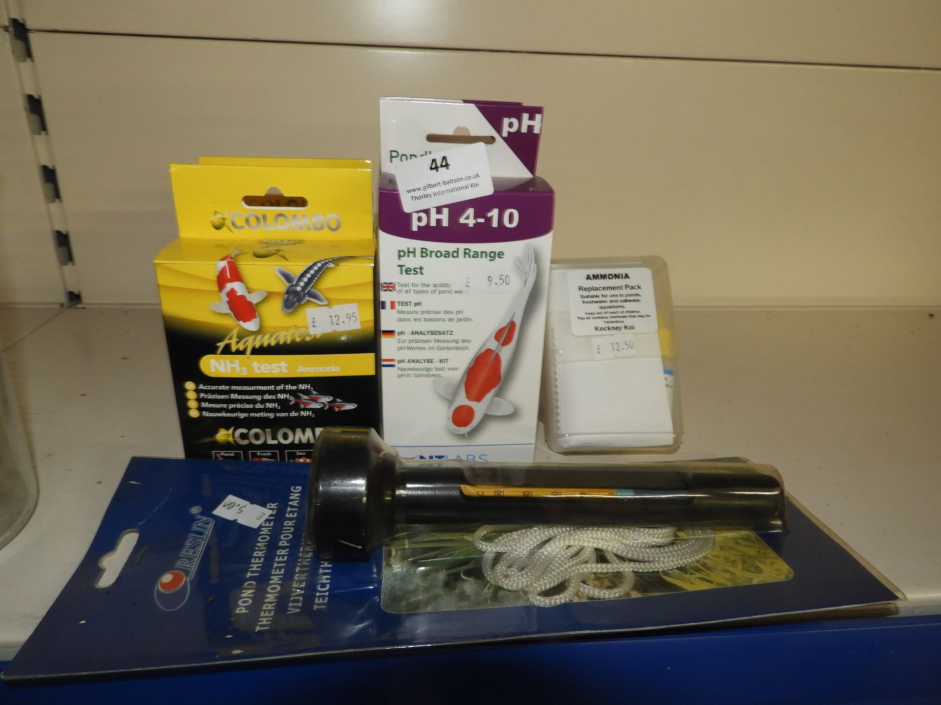 Six Water Testing Kits and a Thermometer