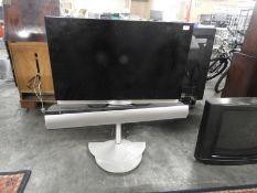 Bang & Olufsen Flatscreen TV with Stand and Soundbar