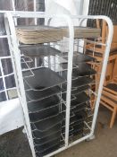 * double mobile tray stand and approx 50 trays