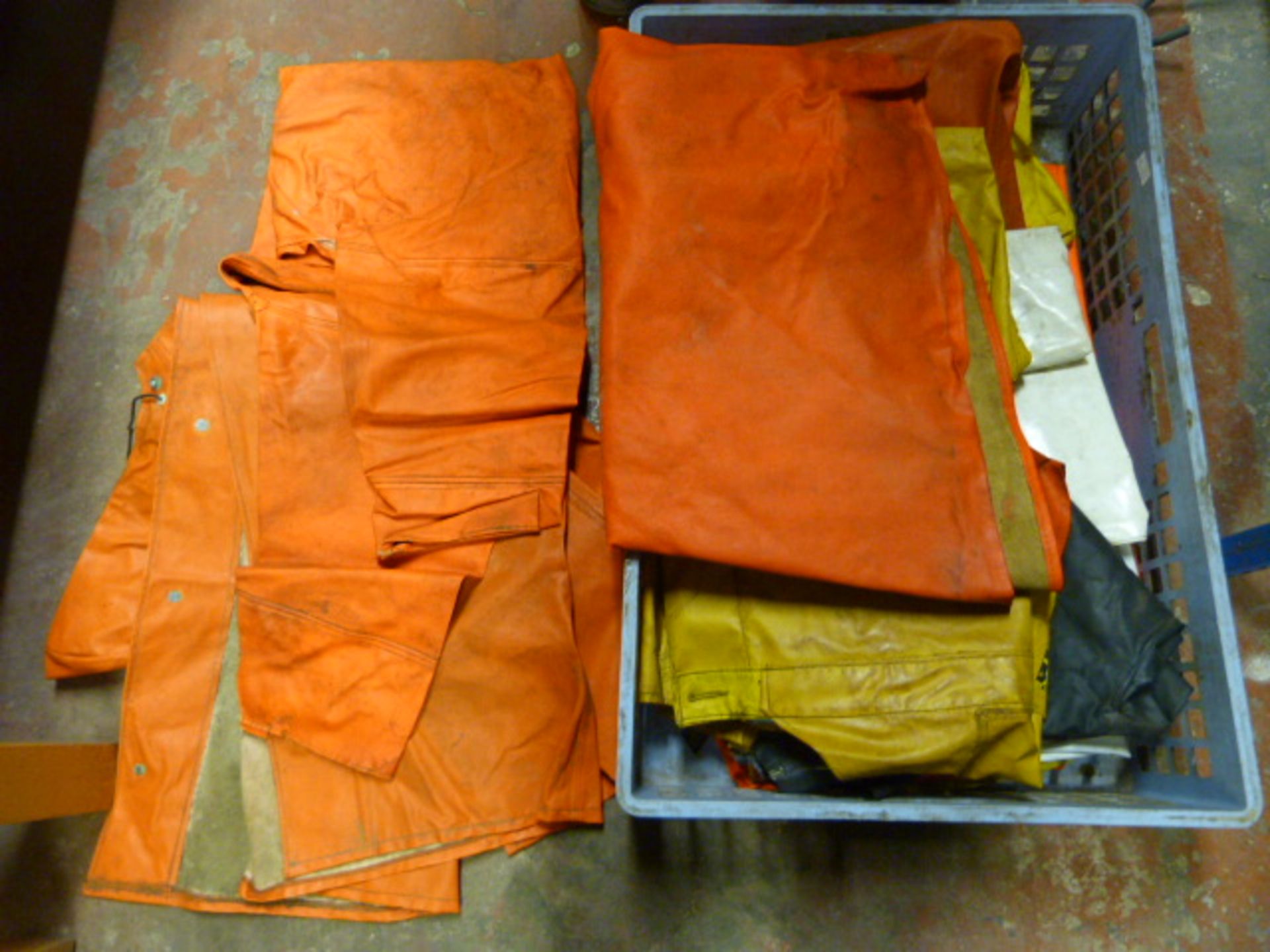 Box of Waterproof Trousers and Jackets